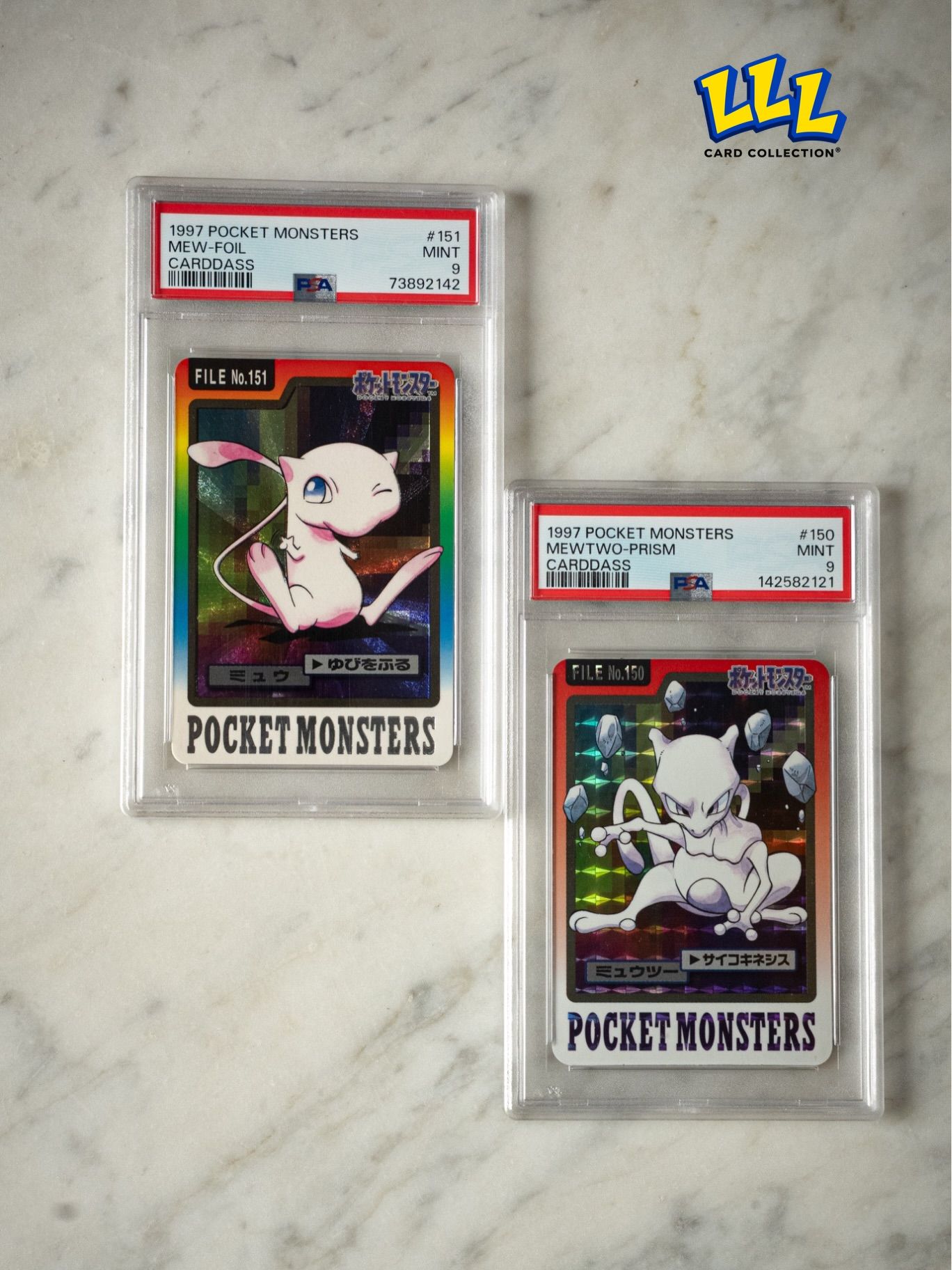Mew and Mewtwo Carddass 1997 cards, both in PSA 9 slabs
